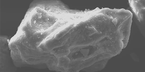 SEM image of quartz grains from the Gibson Bay sand quarry near the Vaal River, to determine whether the grains were transported by wind or water.